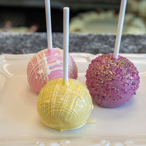 Truffle Cake Pops with colorful chocolate and glitter at Goodies Bakeshop