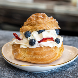 Jumbo Cream Puff with berries at Goodies Bakery Winnipeg